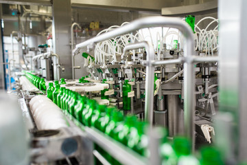 Bottling plant - Water bottling line for processing and bottling water into green glass bottles. 