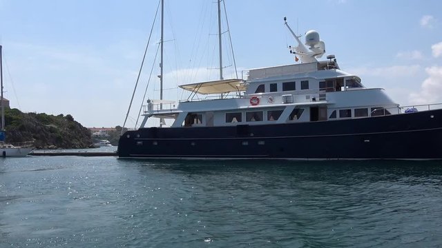 Super Yacht, Mega Luxury Motor Yacht docking in the Balearic Marina