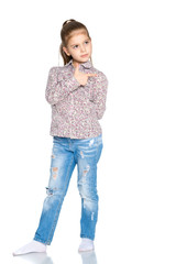Obraz premium Little girl points with a finger