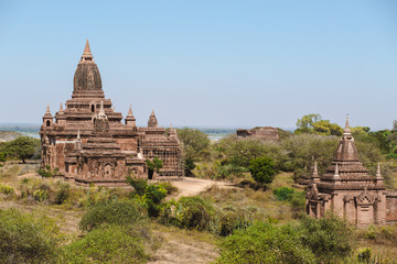 Bagan, Myanmar - FEB 21th 2014: Landscape view with silhouettes of Buddhist monuments tower