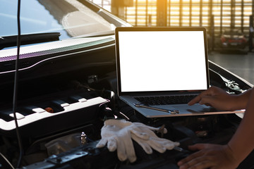 Mechanic repairing a car  in garage  Auto repair car engine, close u