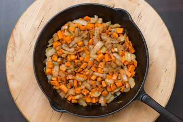 Rustic pan fried vegetables. Healthy vegetarian food cooking concept