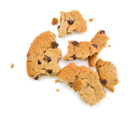Close up of an half eaten cookie with crumb against a white background