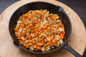 Rustic pan fried vegetables. Healthy vegetarian food cooking concept