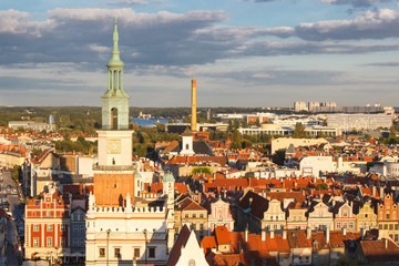 Fototapeta premium Poznan, Poland - August 30, 2016: Town hall, old and modern buildings at sunset in city Poznan
