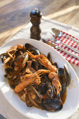 fish soup in a serving dish