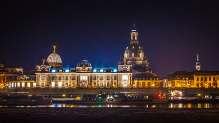 Beautiful night view of the city and reflections in the Elbe river in Dresden, Germany
