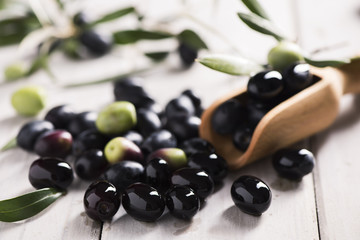 Black Olives on a white table