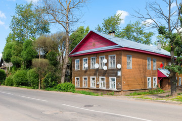 Fototapeta na wymiar OKULOVKA, NOVGOROD REGION, RUSSIA - AUGUST 10, 2017:Residential two-storey house in the countryside