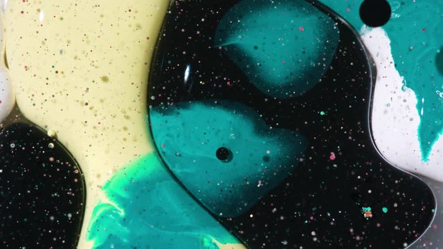 Top view Bright Collors Bubbles Slow Motion Oil Ink is fantastic structure of colorful chaotic motion bubbles stock video is a beautiful, unique, organic 4K clip.