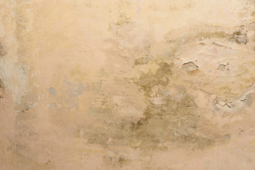 Wall fragment with scratches and cracks
