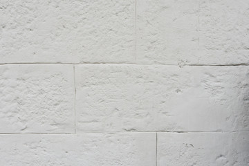 Wall fragment with scratches and cracks