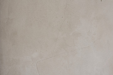 Wall fragment with scratches and cracks