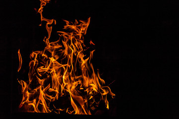 Fire flame on the black background fire in darkness