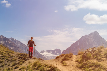 young man walking in mountains