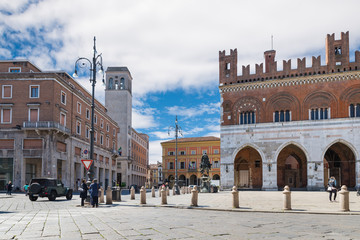 Fototapeta premium Piacenza, medieval town, Italy. City center with piazza Cavalli (square horses), palazzo Gotico (gothic palace - XIII century) and palazzo dei Mercanti (merchants' palace - XVII century)