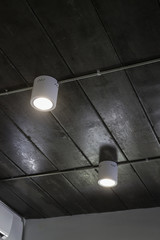 Energy efficient light bulb on ceiling