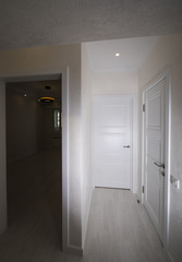 empty white room interior, white ceiling, walls and floor