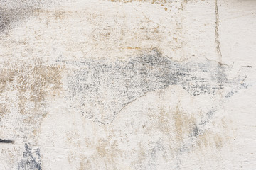 Wall fragment with scratches and cracks