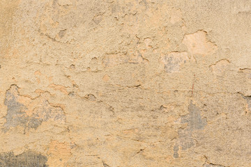 Wall fragment with scratches and cracks