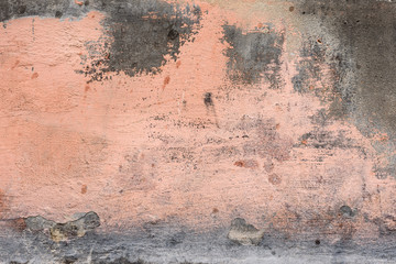 Wall fragment with scratches and cracks