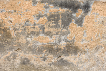 Wall fragment with scratches and cracks
