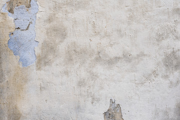 Wall fragment with scratches and cracks