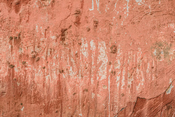 Wall fragment with scratches and cracks
