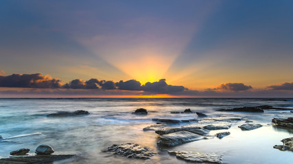 Fototapeta na wymiar Sunrise Seascape and Sun Rays