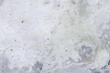 Wall fragment with scratches and cracks