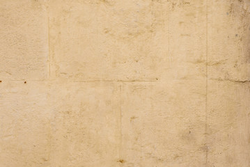 Wall fragment with scratches and cracks