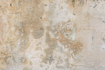 Wall fragment with scratches and cracks