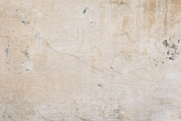 Fototapeta premium Wall fragment with scratches and cracks