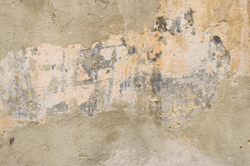 Wall fragment with scratches and cracks