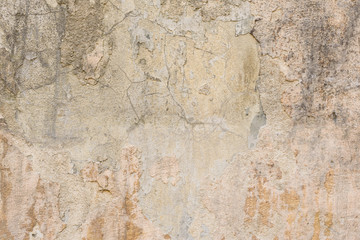 Wall fragment with scratches and cracks