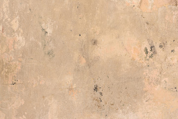 Wall fragment with scratches and cracks