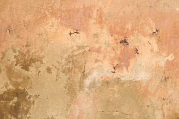 Wall fragment with scratches and cracks
