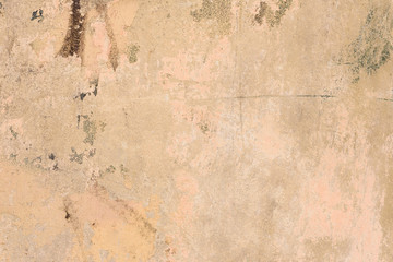 Wall fragment with scratches and cracks