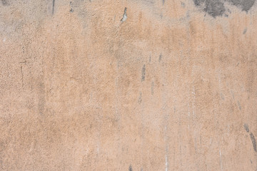 Wall fragment with scratches and cracks