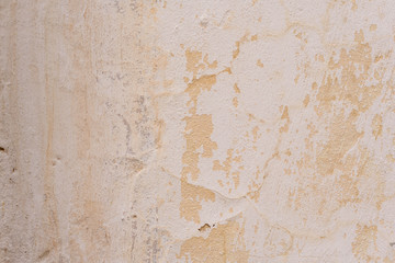 Wall fragment with scratches and cracks