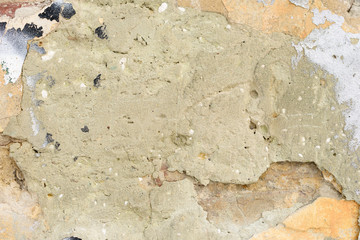Wall fragment with scratches and cracks