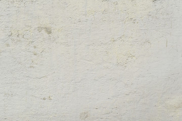Wall fragment with scratches and cracks