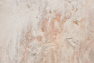 Wall fragment with scratches and cracks