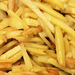 Background of food. Fried potatoes. French fries. Yellow