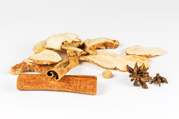 Spices for stewed beef on white background.