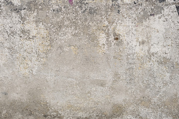 Wall fragment with scratches and cracks