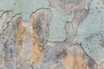 Wall fragment with scratches and cracks