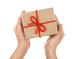 Woman holding parcel on white background