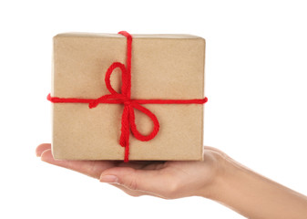 Woman holding parcel on white background