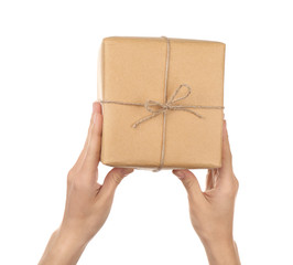 Woman holding parcel on white background